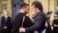 Ukrainian President Volodymyr Zelenskiy (right) greets Javier Milei on the day of his inauguration as president of Argentina in Buenos Aires on December 10. 