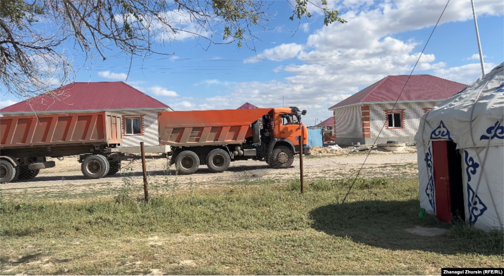 Near this yurt are signs of progress: bags of cement and construction trucks rumbling by. But for many villagers, the pace of reconstruction is too slow, and concerns are growing that they will be spending the winter living in tents or yurts.