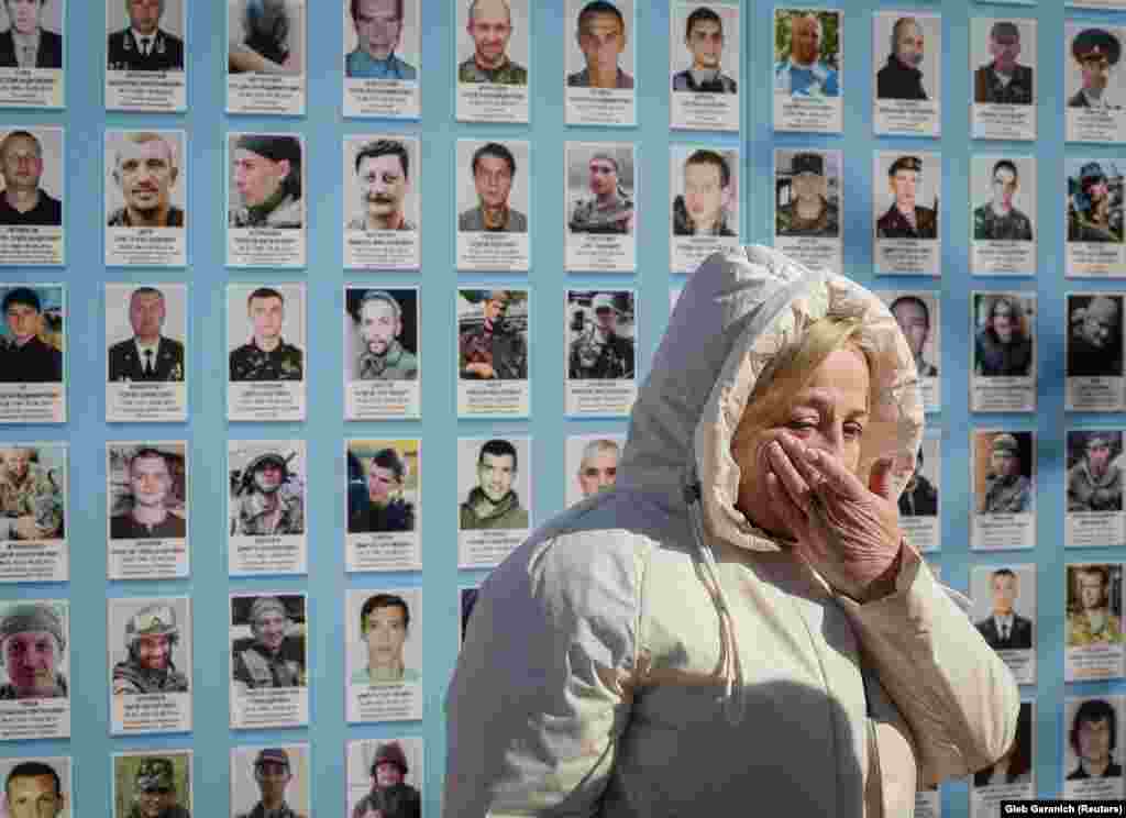 Relatives were able to pay tribute to and mourn their fallen loved ones, whose pictures adorn the wall.