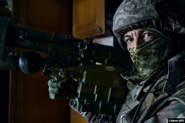 A Ukrainian soldier holds an Igla rocket launcher in Bakhmut on April 26.