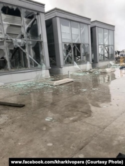 A March 12, 2022, photo from the theater's social media page shows the shattered windows suffered during a missile strike.