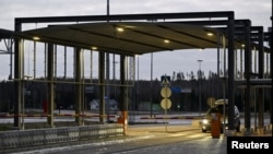 A car is seen at the border between Russia and Finland at the Nuijamaa border checkpoint in Lappeenranta, Finland, on November 16.