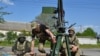 Мобільна група швидкого реагування Національної гвардії України патрулює Херсон із кулеметом