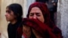 Një grua e mërzitur palestineze, pas rinisjes së sulmeve në Gazë.