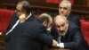 Armenia - Prime Minister Nikol Pashinian shares a word with Foreign Minister Ararat Mirzoyan during a parliament session, December 6, 2023.