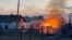 A building burns in the town of Sudzha following an incursion of Ukrainian troops into Russia's Kursk region in this still image from video taken on August 7.