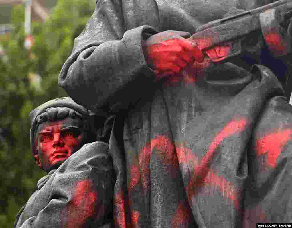 A monument to a Soviet soldier is vandalized with red paint in Sofia, Bulgaria