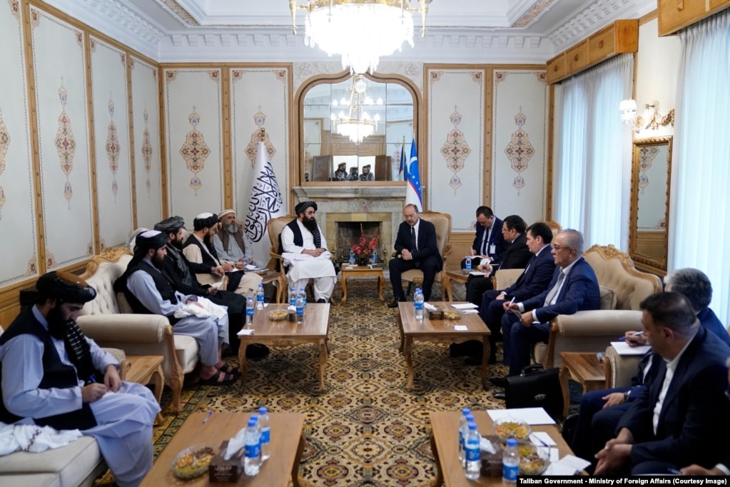 Taliban Foreign Minister Amir Khan Mutaqi (center left) meets Uzbek Prime Minister Abdulla Oripov (center right) in Kabul in August.