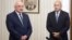 Bulgarian President Rumen Radev (right) meets with interim Prime Minister Dimitar Glavchev.