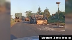 Residents of the Kursk region shared videos that appear to show dead Russian soldiers among destroyed military vehicles scattered along a local road.