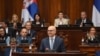 Мандатарот за состав на новата Влада на Србија Милош Вучевиќ при претставување на експозето во парламентот, 1 мај 2024 година.