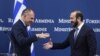Armenia - Foreign Ministers Ararat Mirzoyan of Armenia and George Gerapetritis of Greece shake hands at a news conference, Yerevan, January 10, 2024.