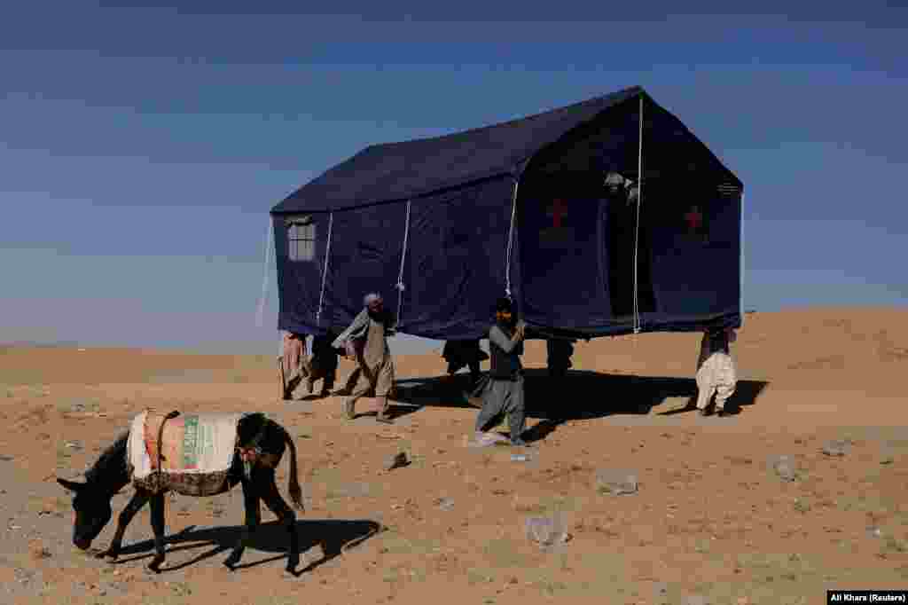 Afghan men carry a tent that will be used to house survivors of the quake. Haq said UN satellite imagery also indicated extreme levels of destruction in the district of Injil. &ldquo;Our humanitarian colleagues warn that children are particularly vulnerable and have suffered severe psychological distress from the earthquake,&rdquo; he said.