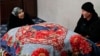 Uzbek Energy Crisis Revives Use Of Ancient 'Sandal' Heating Table 