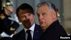 Emmanuel Macron francia elnök és Orbán Viktor magyar miniszterelnök Párizsban 2023. december 7-én