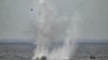 Romanian military detonates an explosive charge to simulate the destroying of a mine off the Black Sea. (file photo)