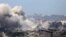Клубы дыма после израильского удара по Газе