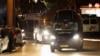 A vehicle carrying hostages released as part of a deal between Israel and the Palestinian extremist group Hamas arrives at the Sheba Medical Center, in Ramat Gan, Israel, on November 26. 