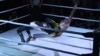 A pro wrestler known as Gambit flips an opponent at a bout in Kyiv.