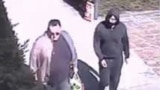 A still image taken from surveillance video allegedly showing Artyom Uss (R) escaping house arrest in Milan, Italy, on Mar. 22, 2023. 