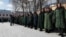 Молода жінка на зустрічі очільника РФ Володимира Путіна з випускниками вищих військових навчальних закладів. Москва, 2023 рік