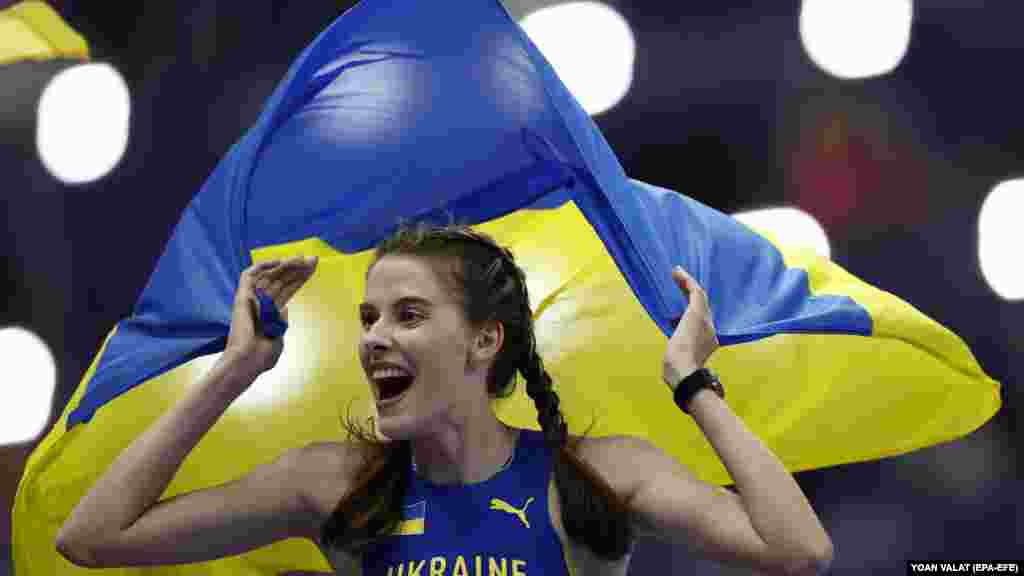 Yaroslava Mahuchikh of Ukraine celebrates winning a gold medal in the women&#39;s high jump final on August 4. Mahuchikh dedicated her Olympic medal to the nearly 500 athletes and coaches who have been killed since Russia invaded her country in 2022.