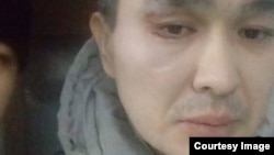 Aidar Syzdyqov also said he was beaten by police officers after being detained on December 6.