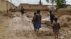 یک منطقه سیلاب‌زده در ولایت بغلان که مکاتب نیز در آن تخریب شده و اطفال از رفتن به مکتب محروم مانده اند.