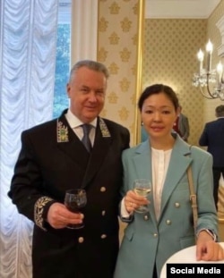 Saltanat Sakembaeva (right) stands next to Aleksandr Lukashevich, Russia's permanent representative to the OSCE, at the Russian Embassy in Vienna in June 2022.