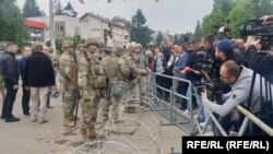 KFOR peacekeeping forces set up barricades in Leposavic on May 29.