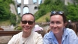 GRAB Husband Of Detained U.S. Journalist In Russia Says His Wife Is A 'Political Prisoner'