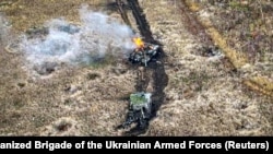 Damaged Russian tanks are seen in a field near the town of Vuhledar, Donetsk region, Ukraine, in November 2023.