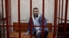 За даними російського видання «Медіазона», один із адвокатів (Ігор Сергунін, на фото) визнав провину