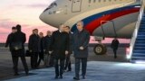 Russian President Vladimir Putin (left) talks to his Kazakh counterpart, Qasym-Zhomart Toqaev, upon arriving in Astana on November 9.