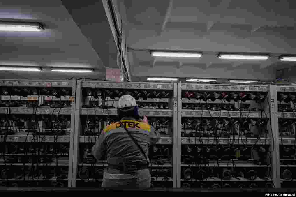 &nbsp;A female mine employee checks headlamps. After the wartime repeal of the ban, about 400 women now work underground, although that is only 2.5 percent of the total subterranean workforce. One foreman who did not wish to be identified said that with many of the miners being killed or wounded, they expect that women will continue working in the mines long after the war ends.