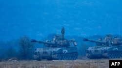 Колонна танков израильской армии на севере страны, 8 октября