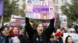 Women with placards that read, &quot;Raise your son&quot; and &quot;We need rights 365 days a year&quot; participated in a rally in celebration of International Women&#39;s Day in Bishkek, Kyrgyzstan, on March 8. The theme for this year&#39;s event was: Invest In Women: Accelerate Progress.