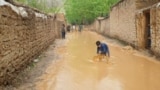 GRAB Muddy Floodwaters Surge Through Afghan Villages