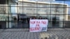 Kosovo: Three girls are seen holding the inscription "There is no peace without the safety of women" in front of the Court in Pristina.