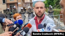 Mladen Perovic was singled out after the head of Kosovo's national journalists' association praised him on Twitter for helping reporters who were stuck in the cafe as mayhem reigned outside. 