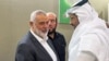 Хамас лидері Исмаил Хания (сол жақта) Дохада. Катар, 11 сәуір 2024 жыл.