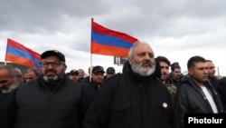 Armenia - Archbishop Bagrat Galstanian, center, leads protesters marching to Yerevan, May 6, 2024.