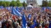 People take part in a pro-EU rally in Chisinau in May. 