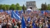 People take part in a pro-EU rally in Chisinau on May 21.