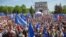 People take part in a pro-EU rally in Chisinau on May 21.