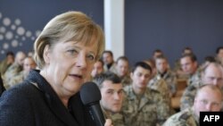 German Chancellor Angela Merkel addresses soldiers during a visit to Kunduz last year. 