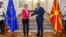 European Commission President Ursula von der Leyen (left) shakes hands with Macedonian Prime Minister Dimitar Kovachevski in Skopje on July 14.