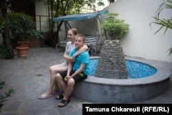 Yevhenia and Mark in the hotel garden