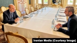 Iranian nuclear negotiator Ali Bagheri Kani (right) and EU negotiator Enrique Mora in Vienna on August 4.