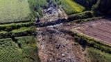 Greece - Debris is seen at the crash site of an Antonov An-12 cargo plane owned by a Ukrainian company, near Kavala, Greece, July 17, 2022